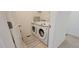 Convenient laundry room with a new, modern washer and dryer, and ample space at 9279 Merino Ct # B, Littleton, CO 80125