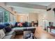 Spacious living room with laminate flooring and large open layout at 384 S Ironton St # 201, Aurora, CO 80012