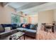 Inviting living room with laminate flooring and expansive layout at 384 S Ironton St # 201, Aurora, CO 80012