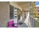 Cozy porch with charming chair; offers a relaxing outdoor space at 384 S Ironton St # 201, Aurora, CO 80012