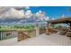 Spacious deck with pergola, scenic views, and comfortable outdoor seating area at 9832 N Crystal Lake Dr, Littleton, CO 80125