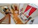 Open dining area with hardwood floors, high ceilings and grand staircase at 9832 N Crystal Lake Dr, Littleton, CO 80125