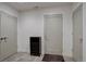 Entryway featuring neutral-toned doors, tile flooring and wine storage at 5469 S Curtice St # L, Littleton, CO 80120