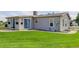 Spacious backyard with lush green lawn and a concrete patio, perfect for outdoor enjoyment at 8481 Uinta St, Commerce City, CO 80022