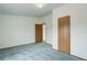 Carpeted bedroom features multiple closets and access to a bathroom, plus a ceiling fan at 8481 Uinta St, Commerce City, CO 80022