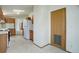 Bright kitchen area featuring essential appliances and wood cabinetry at 8481 Uinta St, Commerce City, CO 80022