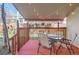 Inviting outdoor deck with string lights and outdoor furniture, perfect for relaxing and entertaining at 2415 E 110Th Dr, Northglenn, CO 80233