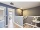 Upstairs hallway with hardwood floors at 2415 E 110Th Dr, Northglenn, CO 80233