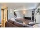Spacious living room features hardwood floors and stairs at 2415 E 110Th Dr, Northglenn, CO 80233