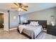 Bedroom with hardwood floors and a ceiling fan at 2415 E 110Th Dr, Northglenn, CO 80233