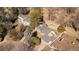 Overhead view of a property showcasing a home with lush landscaping, mature trees, and a private outdoor area at 6110 E 6Th Avenue Pkwy, Denver, CO 80220