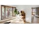 Bright and airy living room with a bay window, hardwood floors, and a cozy reading nook at 6110 E 6Th Avenue Pkwy, Denver, CO 80220