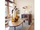 Bright living room featuring floor-to-ceiling windows, modern furniture, and stylish decor at 6110 E 6Th Avenue Pkwy, Denver, CO 80220