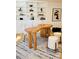 Bright office features a unique wooden desk, white shelving, and stylish decor at 6110 E 6Th Avenue Pkwy, Denver, CO 80220