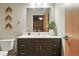 Bathroom featuring a vanity with solid surface countertop and decorative accents at 2955 Inca St # 2D, Denver, CO 80202