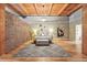 Spacious main bedroom featuring wood floors, exposed beams, and stylish decor at 2955 Inca St # 2D, Denver, CO 80202
