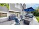 Relaxing backyard with a grill, outdoor seating area, firepit, and partially visible hot tub at 11427 King Way, Westminster, CO 80031