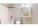 Cozy bathroom featuring a bathtub and shower, vanity sink, and a mirrored medicine cabinet at 11427 King Way, Westminster, CO 80031