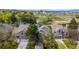Charming townhouse exteriors with well-maintained lawns and attached garages in a serene, landscaped community setting at 11427 King Way, Westminster, CO 80031