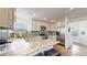 Bright kitchen features granite countertops, stainless steel appliances, and a breakfast bar for casual dining at 11427 King Way, Westminster, CO 80031