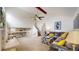 Open living room with vaulted ceiling, ceiling fan, and stairs to the right at 11427 King Way, Westminster, CO 80031