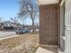 Exterior view of a brick home in a residential neighborhood at 5153 Scranton St, Denver, CO 80239