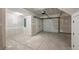 Spacious unfinished two car garage with visible garage door opener and ample room for vehicles and storage at 2140 S Ash St # 105, Denver, CO 80222