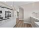 Bright modern kitchen with stainless steel appliances and hardwood floors at 2140 S Ash St # 105, Denver, CO 80222