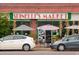 Spinelli's Market on the street offers a variety of local goods and is surrounded by attractive decor at 2140 S Ash St # 105, Denver, CO 80222
