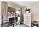 Bedroom view of the sliding glass door leading to the backyard hot tub at 3561 W 131St Ave, Broomfield, CO 80020