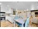 Dining area seamlessly adjoins the open kitchen and living area for easy living at 3561 W 131St Ave, Broomfield, CO 80020