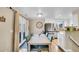 Cozy dining area featuring an adjacent kitchen, natural light and seating for six at 3561 W 131St Ave, Broomfield, CO 80020