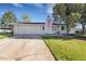 Lovely one-story home with an attached garage and mature trees, set on a well-manicured lawn at 3561 W 131St Ave, Broomfield, CO 80020
