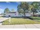 Charming single-story home with a well-maintained lawn, mature tree, and an attached two-car garage at 3561 W 131St Ave, Broomfield, CO 80020