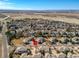 Aerial perspective capturing the community, located near a scenic open space with mountain views at 14033 E Whitaker Dr, Aurora, CO 80015