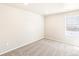 Neutral bedroom featuring plush carpet and natural light at 781 N Tempe St, Aurora, CO 80018