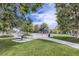 Community park with playground, picnic tables, and walking paths at 4144 Tennyson St # 212, Denver, CO 80212
