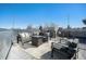 Rooftop patio featuring outdoor seating, decor pillows, and open sky views at 4144 Tennyson St # 212, Denver, CO 80212
