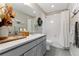 Bathroom features vanity, shower and decorative accents at 19121 E 65Th Ave, Denver, CO 80249