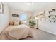 Bedroom showcasing a bed and unique wall art at 19121 E 65Th Ave, Denver, CO 80249