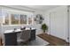 Charming office space featuring a bay window with backyard view, a cozy rug, and ample natural light at 575 2Nd St, Bennett, CO 80102