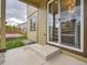 Back porch featuring a sliding glass door and a concrete patio at 4862 S Piccadilly Ct, Aurora, CO 80015