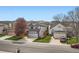 Charming two-story home boasts beautiful landscaping, a two-car garage, and a welcoming curb appeal at 5648 S Youngfield Way, Littleton, CO 80127
