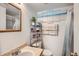 Comfortable bathroom featuring light colors, artwork, sink and vanity at 187 W Prestwick Ct, Castle Rock, CO 80104
