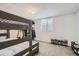 Bedroom with bunkbeds, closet space, and window at 187 W Prestwick Ct, Castle Rock, CO 80104