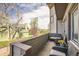 Deck with views, featuring comfortable seating, a small side table, and outdoor carpet at 187 W Prestwick Ct, Castle Rock, CO 80104