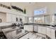 Modern kitchen features granite countertops and stainless steel appliances at 187 W Prestwick Ct, Castle Rock, CO 80104