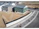 Aerial view of a modern home's backyard with fence and landscaping at 3889 N Shawee St, Aurora, CO 80019