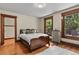 Bright bedroom with natural light, hardwood floors, and classic trim at 2716 N Vine St, Denver, CO 80205