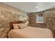 Bedroom with vintage charm showcasing textured walls and natural light at 2716 N Vine St, Denver, CO 80205